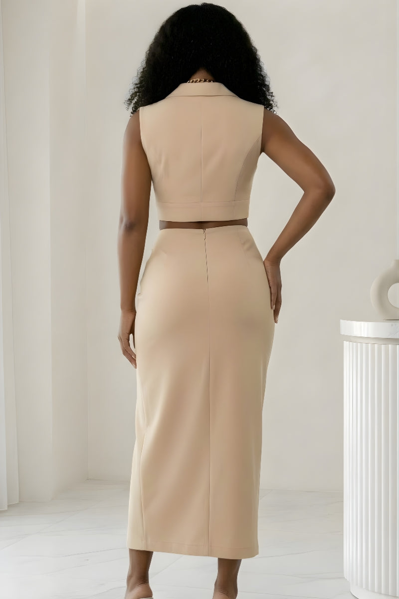Beige sleeveless button-up crop top and a high-waisted wrap maxi skirt